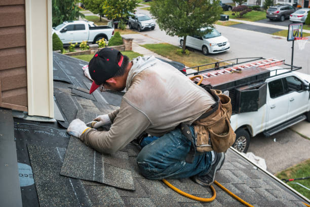 Professional Roofing technician working in Southport, NC